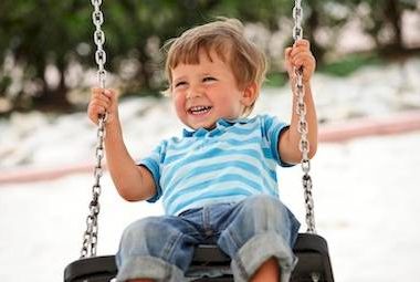 Montessori Kids Universe | A Montessori/Reggio Preschool Daycare Childcare | child swinging